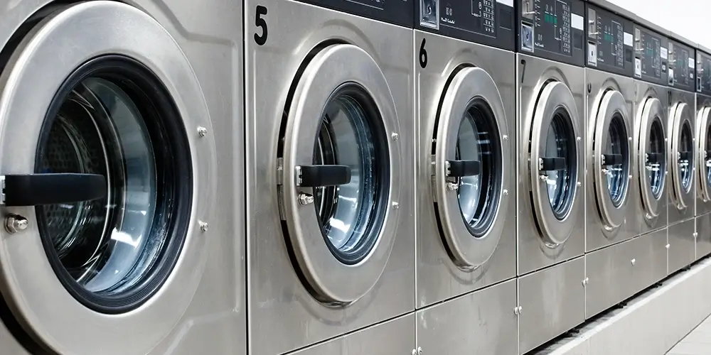 Commercial laundry with steel washers